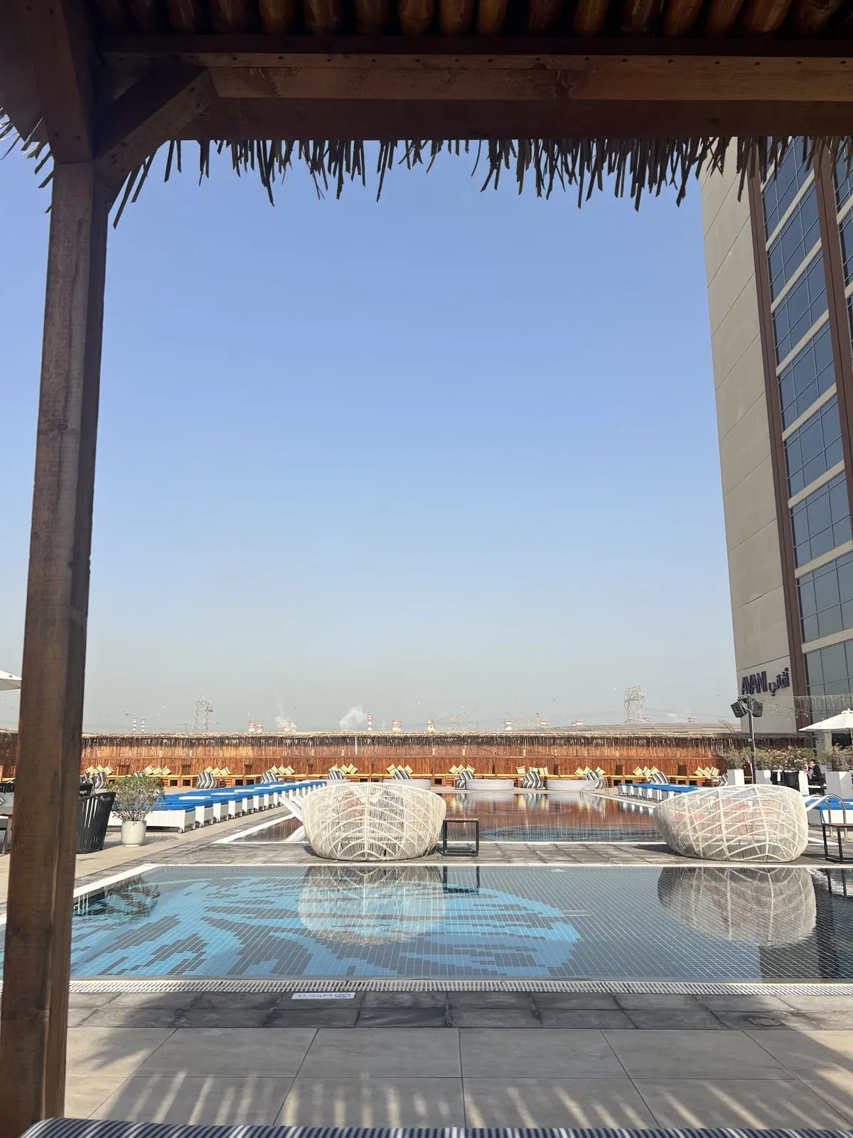 View of hotel pool from a cabana