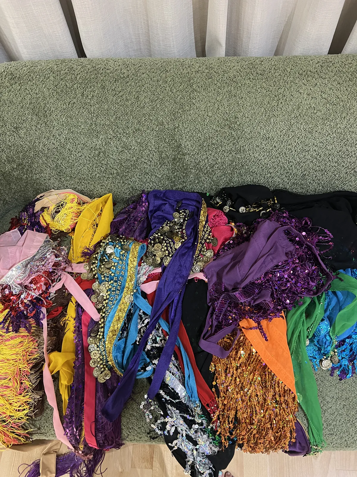 Dance belts spread out on a couch